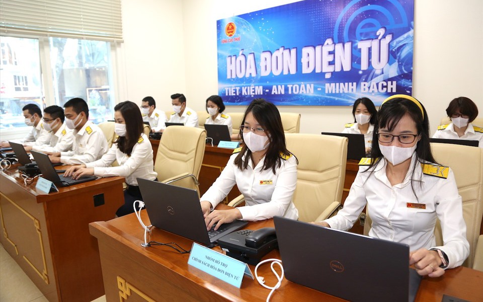 Hóa đơn điện tử: Doanh nghiệp tiết kiệm hàng tỷ đồng mỗi năm - Ảnh 1.