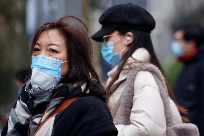 Gia tăng các bệnh truyền nhiễm đường hô hấp, Trung Quốc kêu gọi người dân đeo khẩu trang- Ảnh 1.