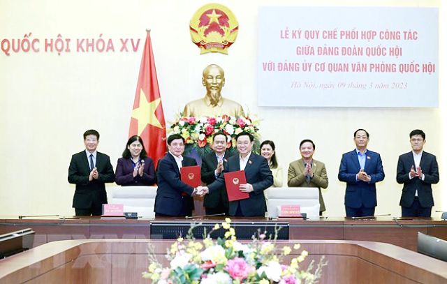 Đảng đoàn và Đảng ủy cơ quan Văn phòng Quốc hội ký Quy chế phối hợp - Ảnh 1.