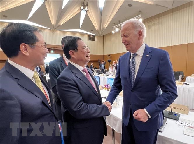 Hội nghị thượng đỉnh G7 mở rộng: Thủ tướng Phạm Minh Chính gặp Tổng thống Mỹ Joe Biden - Ảnh 1.