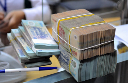 Tiền Việt mất giá 2% trong khi nhiều ngoại tệ mạnh mất giá hơn 10%- Ảnh 1.