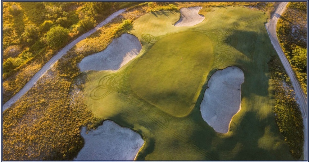Aerial view of a golf course  Description automatically generated