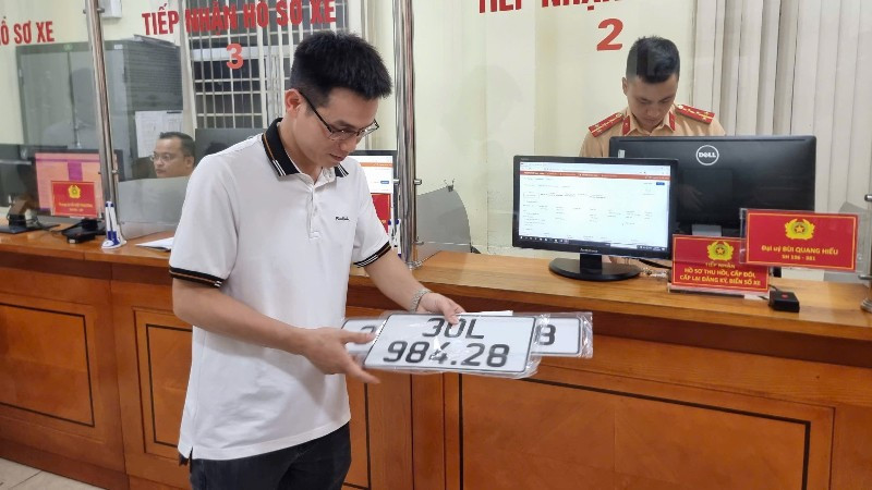 Địa chỉ đăng ký xe tại Hà Nội từ 1/7 - Ảnh 1.