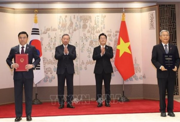 Tổng Bí thư Tô Lâm chứng kiến Lễ trao các văn kiện hợp tác song phương Việt Nam - Hàn Quốc - Ảnh 1.