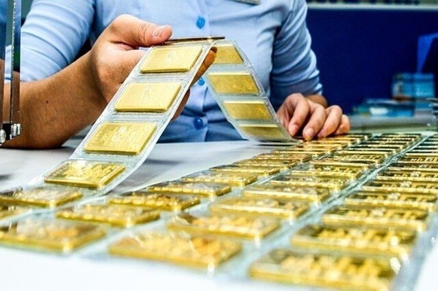 Giá vàng trong nước và thế giới đồng loạt thiết lập kỷ lục mới- Ảnh 1.