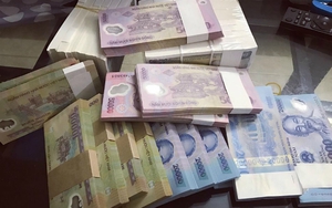 Đổi tiền mới để "l&igrave; x&igrave;" c&oacute; thể bị phạt đến h&agrave;ng chục triệu đồng - Ảnh 2.