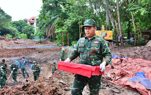 Tổ chức Lễ viếng, Lễ truy điệu v&agrave; an t&aacute;ng h&agrave;i cốt liệt sĩ được t&igrave;m kiếm, quy tập tại C&ocirc;ng vi&ecirc;n L&ecirc; Thị Ri&ecirc;ng - Ảnh 2.