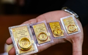 Gi&aacute; v&agrave;ng ng&agrave;y 20/3 giảm s&acirc;u, người mua lỗ 12 triệu đồng- Ảnh 2.