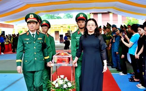 Đồng Nai đ&oacute;n 62 h&agrave;i cốt liệt sĩ từ Campuchia về nước - Ảnh 7.