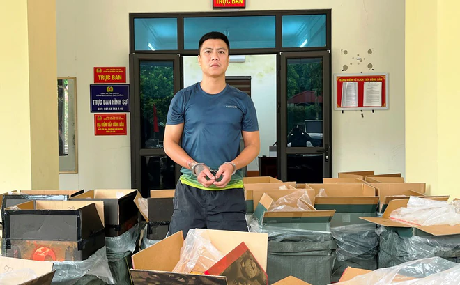 Bắt giữ đối tượng cùng 21.000 bao thuốc lá lậu chở trên xe tải - Ảnh 2.