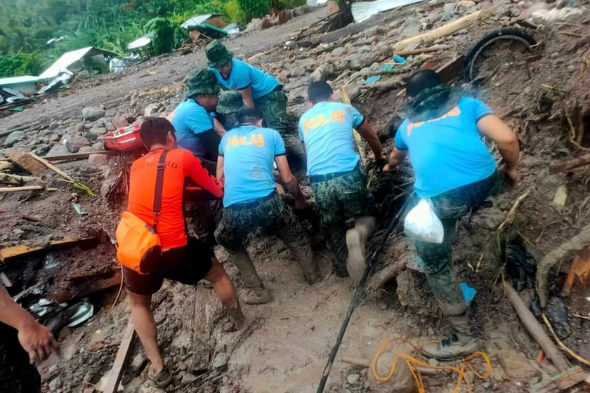 Chùm ảnh bão NALGAE đổ bộ vào Philippines làm 72 người tử vong và hàng chục người bị thương - Ảnh 4.