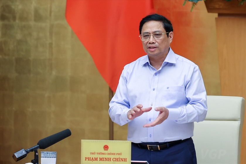 Thủ tướng Phạm Minh Chính: Đề nghị Bộ Công an có giải pháp về mẫu hộ chiếu mới - Ảnh 1.