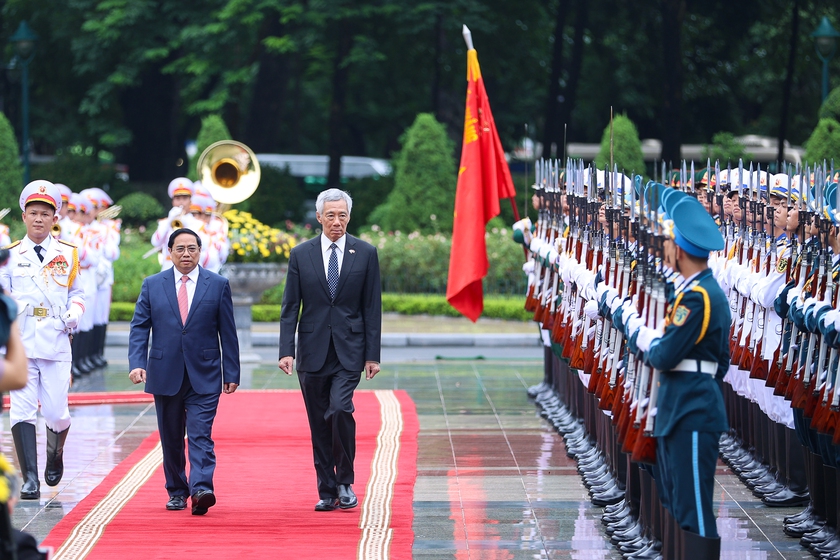 Thủ tướng Chính phủ Phạm Minh Chính chủ trì lễ đón Thủ tướng Singapore Lý Hiển Long - Ảnh 3.