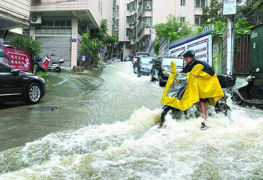 Bão Haikui gây lũ lụt nghiêm trọng ở miền đông nam Trung Quốc- Ảnh 4.