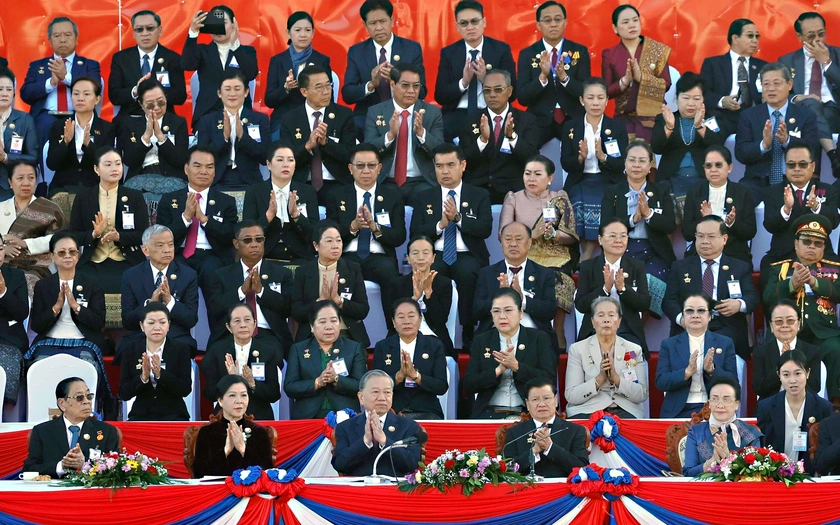 Tổng Bí thư Tô Lâm và Phu nhân dự Lễ kỷ niệm 50 năm Quốc khánh Lào - Ảnh 1.