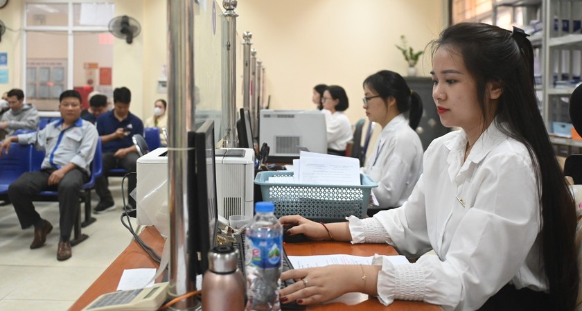 Lãnh đạo cấp huyện được ưu tiên về làm lãnh đạo xã, phường mới sau sáp nhập - Ảnh 1.