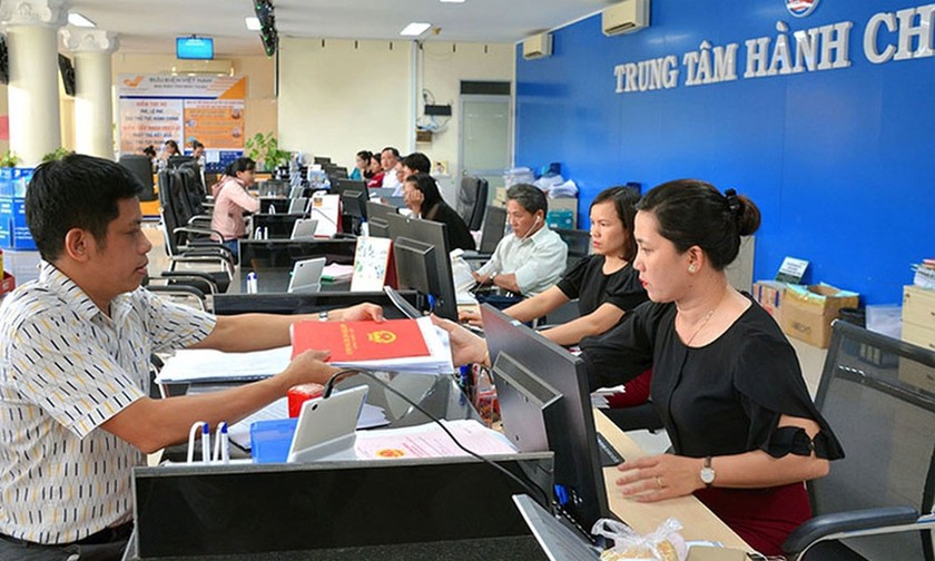 Người dân có thể làm thủ tục hành chính ở bất kì xã, phường nào trong tỉnh- Ảnh 1. Người dân có thể làm thủ tục hành chính ở bất kì xã, phường nào trong tỉnh- Ảnh 1.