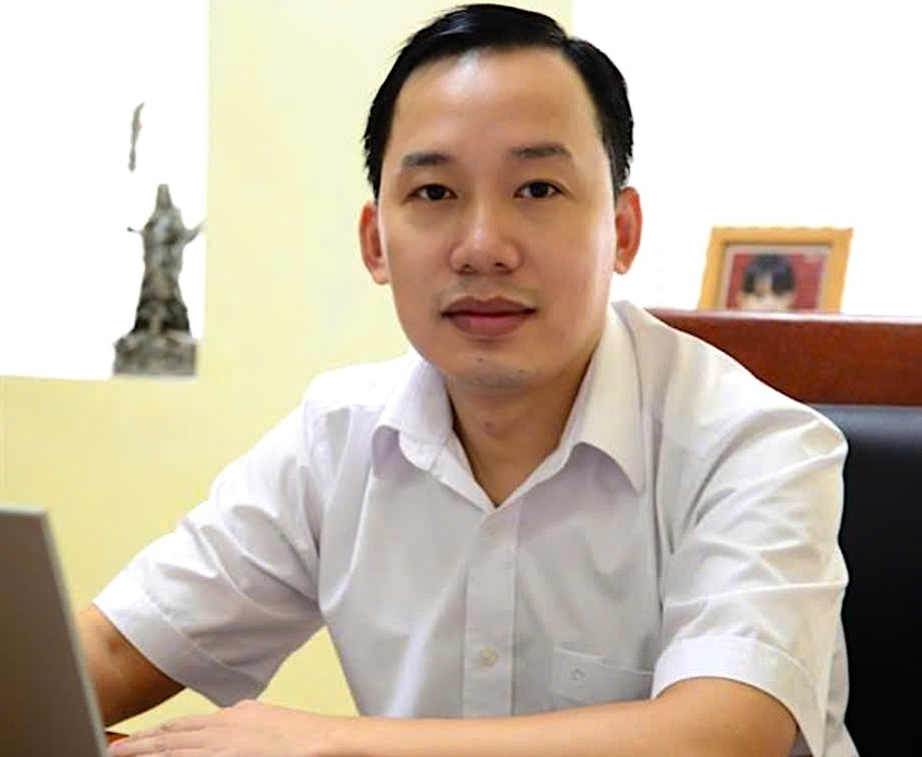 Phó Giáo sư Trịnh Tiến Việt giữ chức vụ quyền Hiệu trưởng Trường Đại học Luật, Đại học Quốc gia Hà Nội - Ảnh 1.