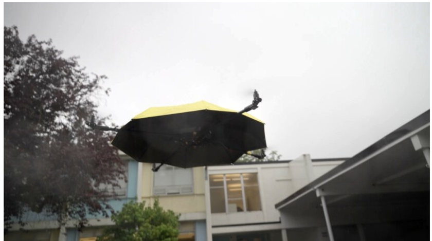 &Ocirc; bay: Khi chiếc &ocirc; che mưa nắng kh&ocirc;ng c&ograve;n phải cầm tay - Ảnh 1.