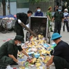 Phát hiện hàng nghìn hộp thực phẩm chức năng chưa sử dụng vứt ở bãi rác thành phố Hạ Long